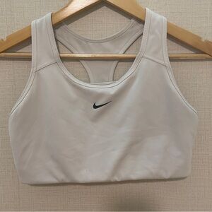 Nike white racerback sports bra. Size: large